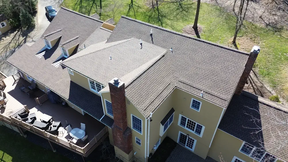 Finished custom deck with outdoor furniture installation in Central New Jersey